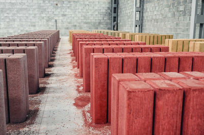 Drying of finished paving stones at factory. concrete palisades. colored paving stones