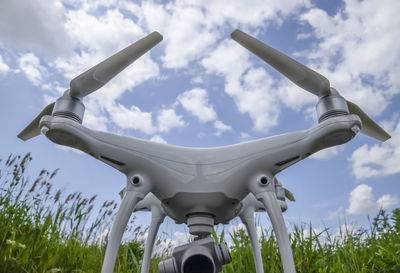 Close-up of airplane against sky