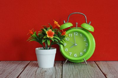 Close-up of alarm clock on table