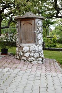 View of built structure with trees in foreground