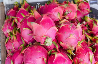 Close-up of pink fruits for sale in market
