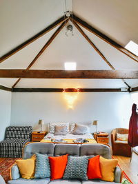 Illuminated lights hanging on chair at home