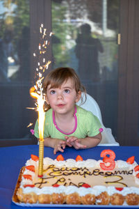 Portrait of girl with chocolate cake