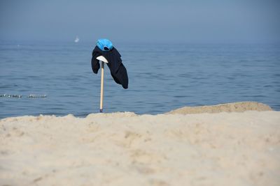 Scenic view of sea against blue sky