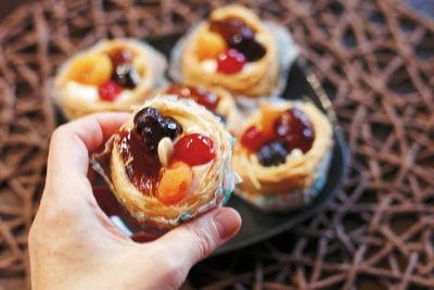 Midsection of person holding ice cream