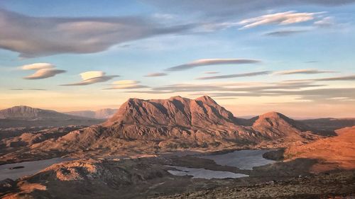 Scenic view of mountains against sky during sunset