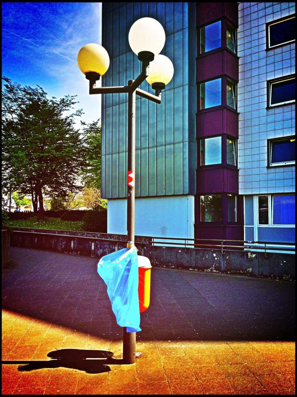 built structure, full length, building exterior, architecture, yellow, rear view, street light, street, lifestyles, men, leisure activity, childhood, umbrella, standing, walking, blue, city, casual clothing