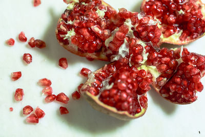 Close-up of pomegranate on white background