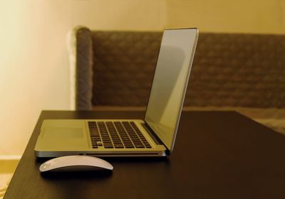 Close-up of laptop on table