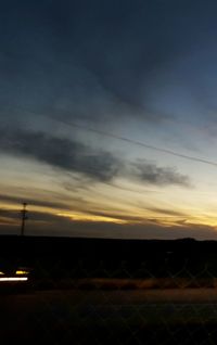 Scenic view of silhouette landscape against sky during sunset