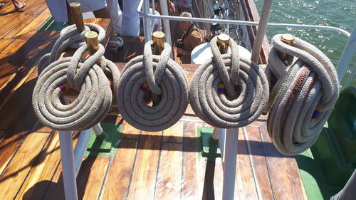 High angle view of ropes tied on metal