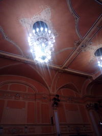 Low angle view of illuminated ceiling