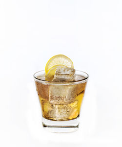 Close-up of drink against white background