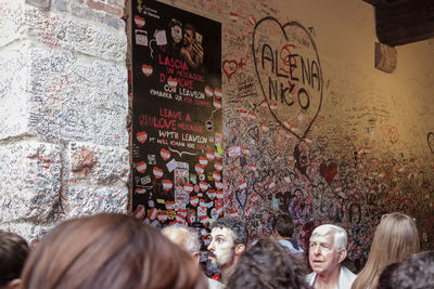 Group of people on wall