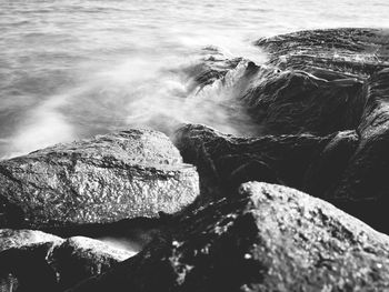 Scenic view of rocks on beach