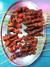 Close-up of meat on barbecue grill