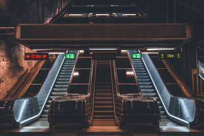 View of illuminated escalator at subway station