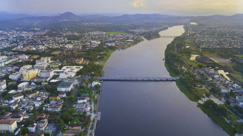 High angle view of river amidst buildings in city