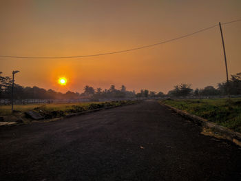 Road against sky during sunset