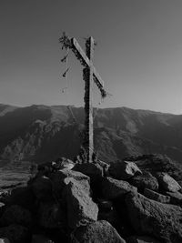 Low angle view of rock against sky