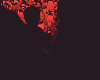 Silhouette people at night