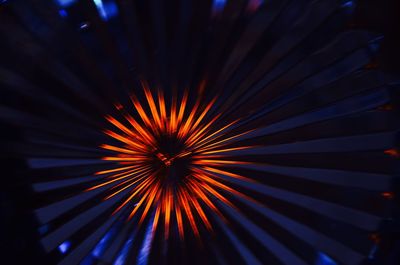 Low angle view of firework display at night