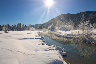 Scenic view of snowcapped mountains against sky