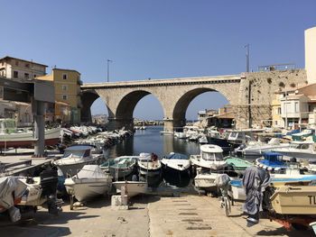 View of bridge in city against clear sky