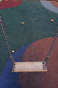 High angle view of empty swing in playground