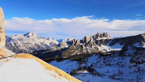 Rocky mountains against sky during winter at cortina d ampezzo