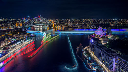 Sydney opera house and sydney harbor bridge at night