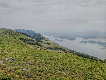 Scenic view of land against sky