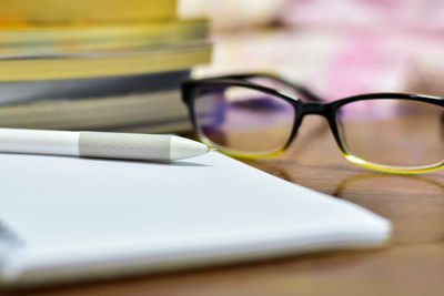 Close-up of sunglasses on table