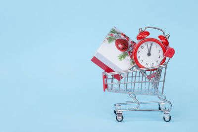 Close-up of clock against blue background