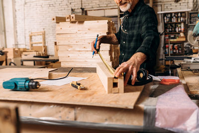 Carpenter working in workshop