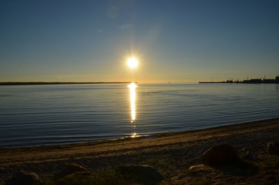 Sun shining over sea