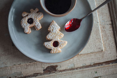 High angle view of christmas cookies on plate