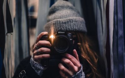 Midsection of man photographing