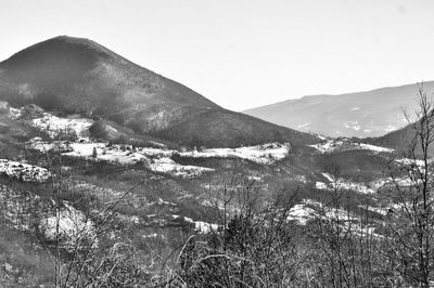 Scenic view of mountains against clear sky