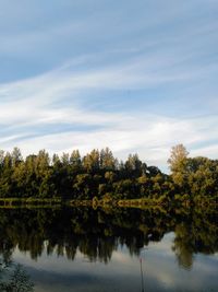 Scenic view of lake against sky during autumn