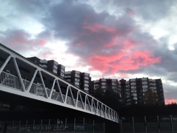 Low angle view of building against cloudy sky