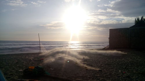 Scenic view of sea at sunset