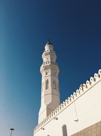 Low angle view of building against clear blue sky