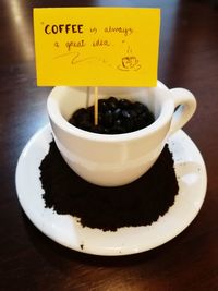 Close-up of coffee cup on table