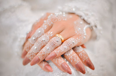 Close-up of woman hand with tattoo