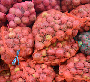 Full frame shot of onions for sale in market