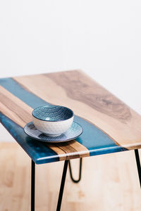 High angle view of hat on table against white background