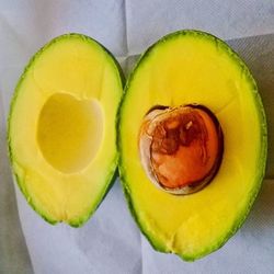 High angle view of lemon in plate on table