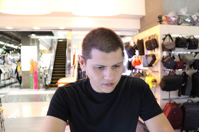 Portrait of young man looking at camera