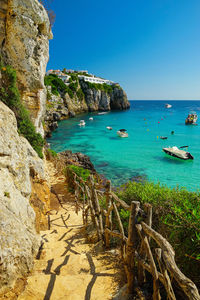 Scenic view of sea against clear blue sky